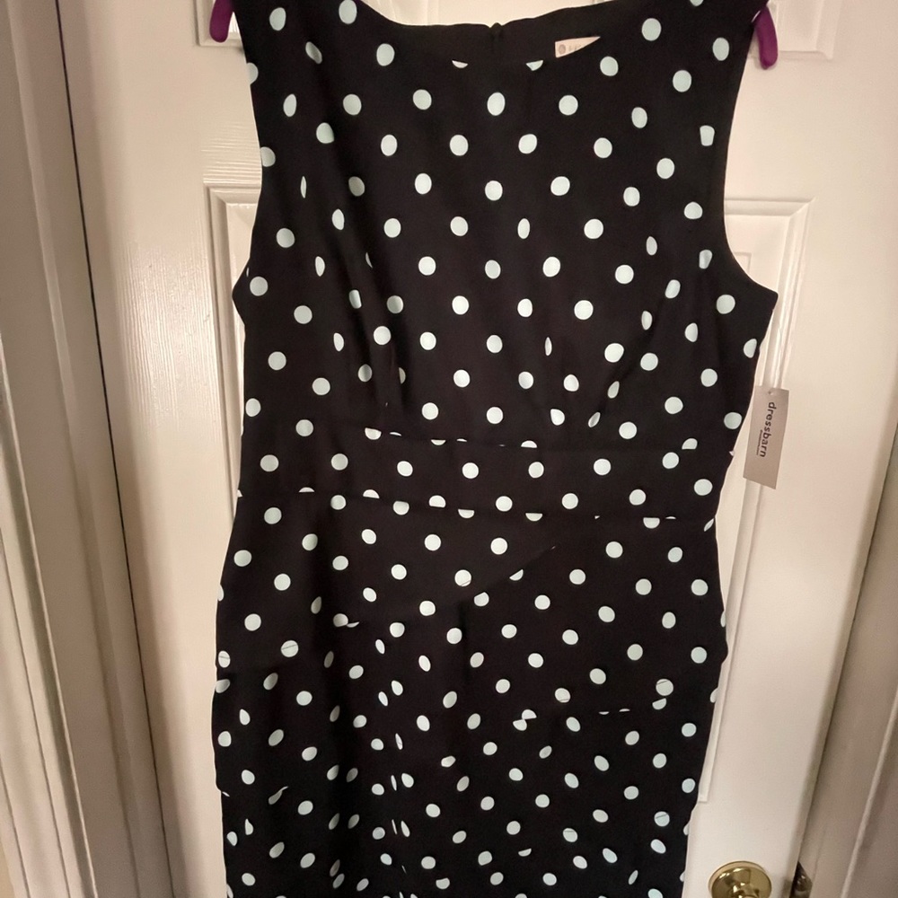 Black and light blue polka dot dress. Can be dressed up or worn casual.